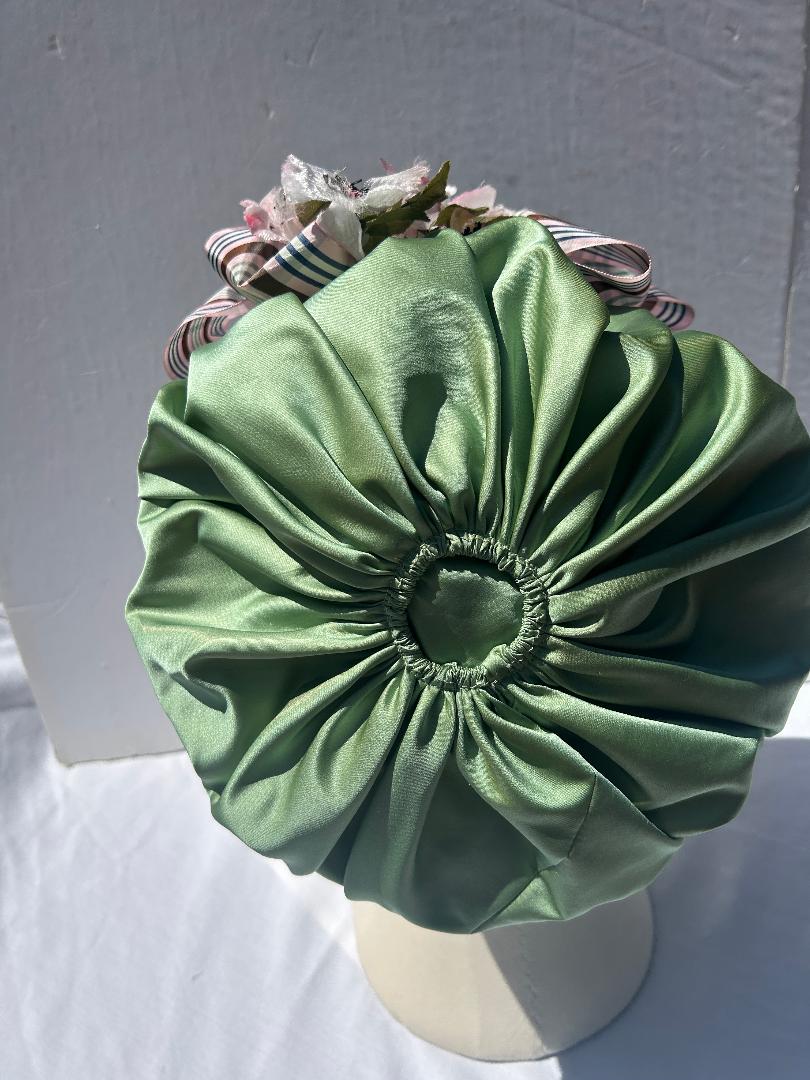 Back view green capote hat